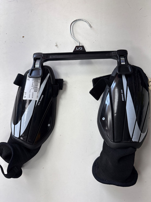 Vist Large View of Product Image Which is Used Nike CHARGE Soccer Shin Guards Adult Black SM