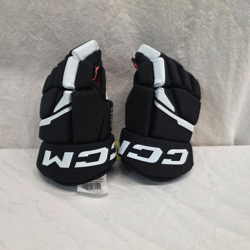 Vist Large View of Product Image Which is Used CCM NEXT YTH HOCKEY GLOVES Youth Gloves Black 9"