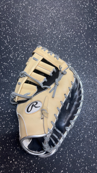 Vist Large View of Product Image Which is Used Rawlings HEART OF THE HIDE BB/SB First Base RH Throw Tan 12 1/2"