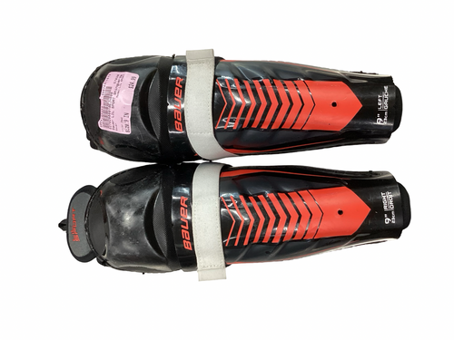 Vist Large View of Product Image Which is Used Bauer LIL SPORT Junior Shin Guards Red 9"