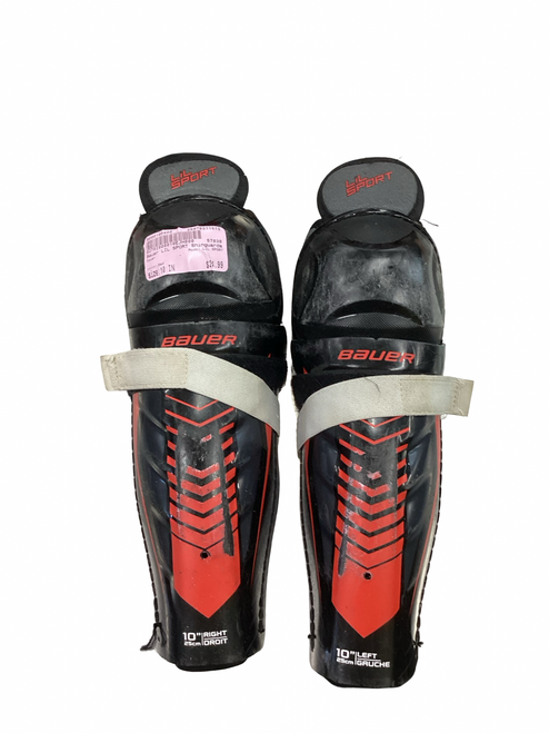 Vist Large View of Product Image Which is Used Bauer LIL SPORT Junior Shin Guards Red 10"