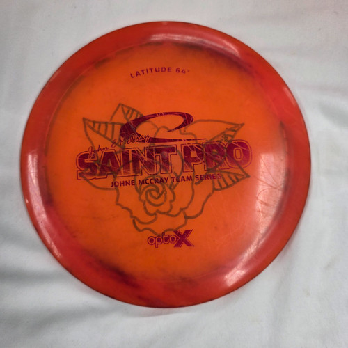 Vist Large View of Product Image Which is Used Latitude 64 OPTO X SAINT PRO Disc Golf Driver Orange
