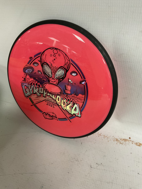 Vist Large View of Product Image Which is Used MVP GYROPALOOZA 2021 UPLINK Disc Golf Mid Range Cardinal