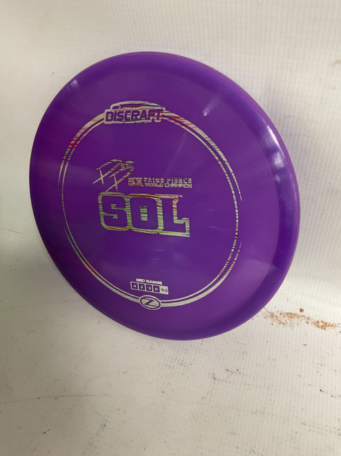 Vist Large View of Product Image Which is Used Discraft Z LINE SOL Disc Golf Mid Range Purple