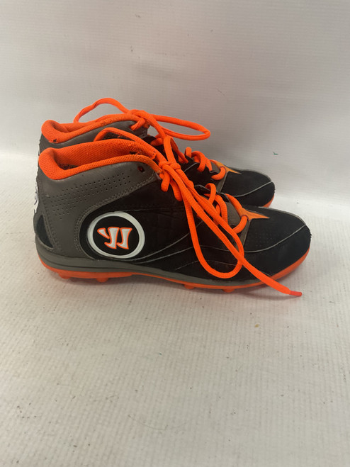 Vist Large View of Product Image Which is Used Warrior LAX Cleats Boys Black And Orange Junior 02.5