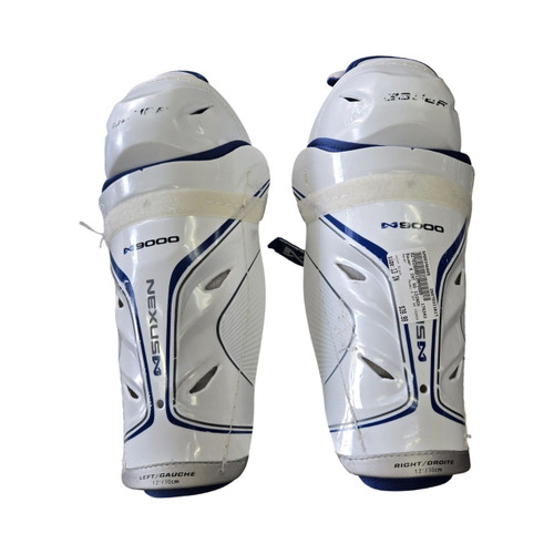 Vist Large View of Product Image Which is Used Bauer NEXUS 9000 SH 12INCH Junior Shin Guards White 12"