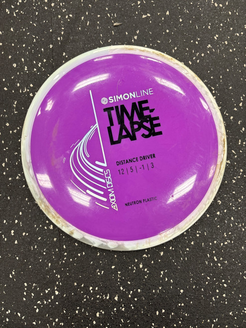 Vist Large View of Product Image Which is Used Axiom NEUTRON TIME LAPSE Disc Golf Driver Purple