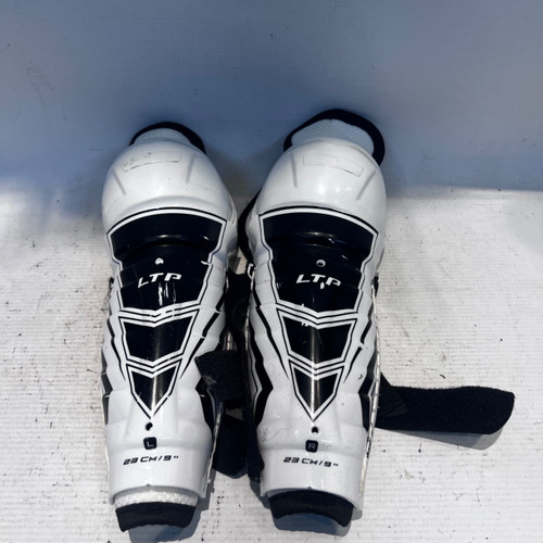 Vist Large View of Product Image Which is Used CCM LTP Junior Shin Guards White 9"