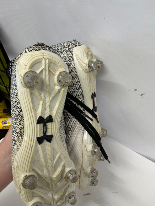 Vist Large View of Product Image Which is Used Under Armour Adult FB Cleats Black Senior 8.5