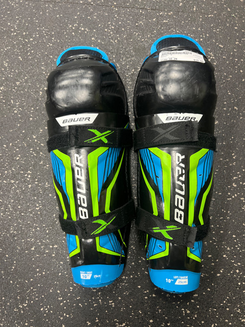 Vist Large View of Product Image Which is Used Bauer X Youth Shin Guards Black 10"