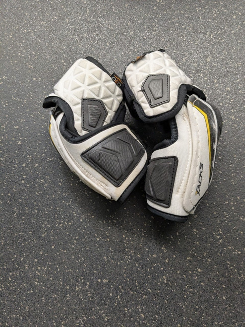 Vist Large View of Product Image Which is Used CCM TACKS ULTRA Junior Elbow Pads LG