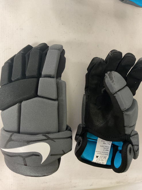 Vist Large View of Product Image Which is Used Nike VAPOR LT Lacrosse Gloves Junior Grey LG