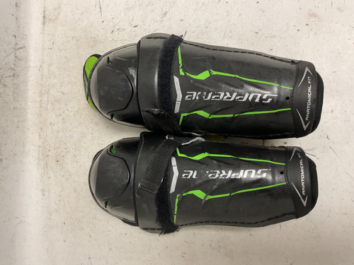 Vist Large View of Product Image Which is Used Bauer SUPREME ONE.6 Youth Shin Guards Black And Green 10"