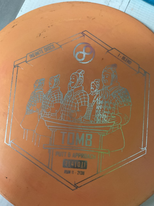Vist Large View of Product Image Which is Used Infinite Discs I-BLEND TOMB Disc Golf Putter Orange