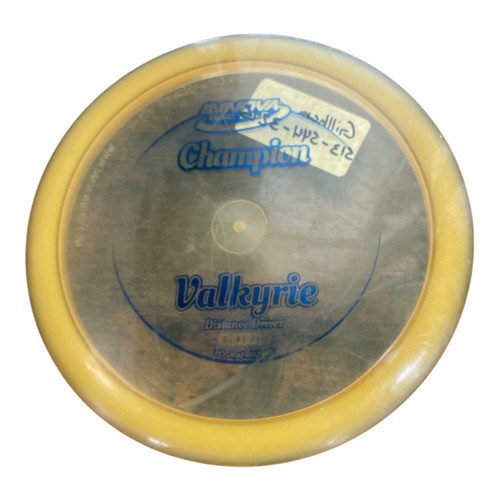 Vist Large View of Product Image Which is Used Innova CHAMPION VALKYRIE Disc Golf Mid Range Yellow