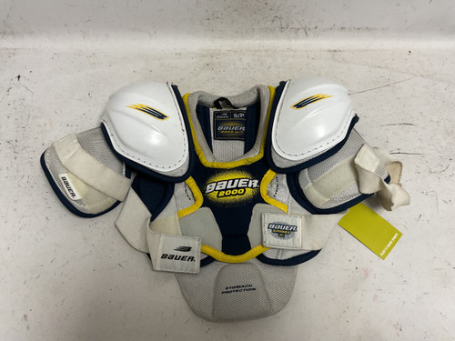 Vist Large View of Product Image Which is Used Bauer SP2000 Junior Shoulder Pads White And Navy Blue SM