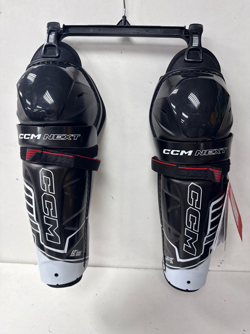 Vist Large View of Product Image Which is New CCM NEXT Junior Shin Guards None 13"