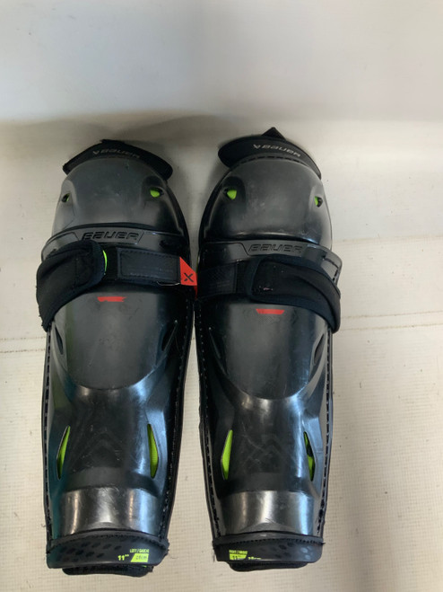 Vist Large View of Product Image Which is Used Bauer VAPOR 3X PRO Junior Shin Guards Black 11"