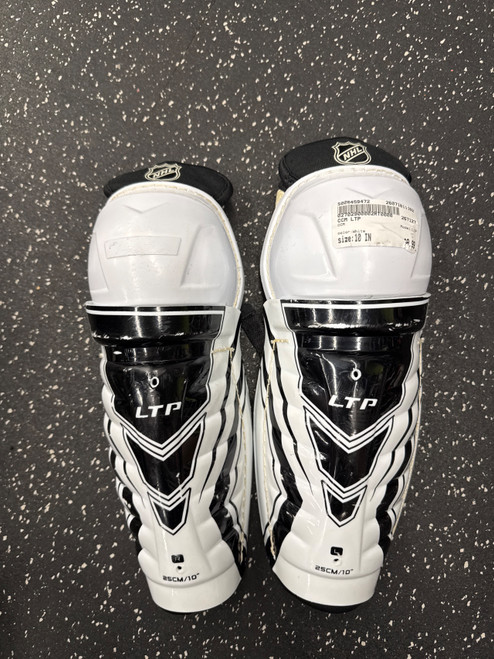 Vist Large View of Product Image Which is Used CCM LTP Junior Shin Guards White 10"