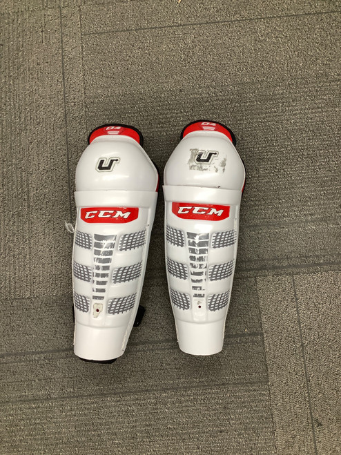 Vist Large View of Product Image Which is Used CCM O4 Junior Shin Guards White 11"
