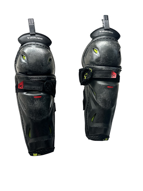 Vist Large View of Product Image Which is Used Bauer VAPOR 3X PRO Junior Shin Guards Black And Grey 11"