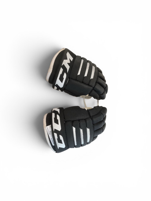 Vist Large View of Product Image Which is Used CCM TACKS 4R2 9 HG Youth Gloves Black 9"