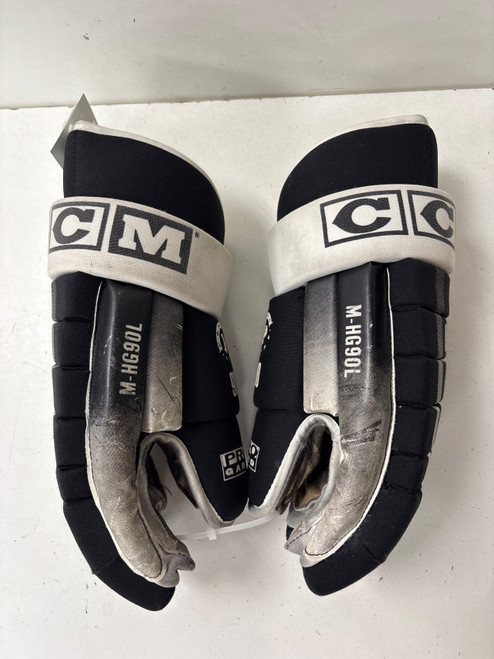 Vist Large View of Product Image Which is Used CCM HG 90 Senior Gloves Black 15"
