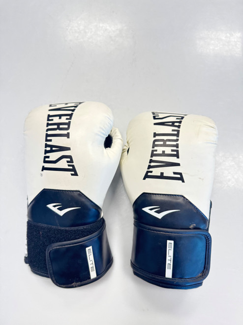 Vist Large View of Product Image Which is Used Everlast 12 OZ Boxing Gloves White Senior