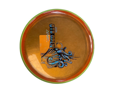 Vist Large View of Product Image Which is Used Axiom PROTON SOFT PARADOX 2024 OTB OPEN Disc Golf Mid Range Orange 173g