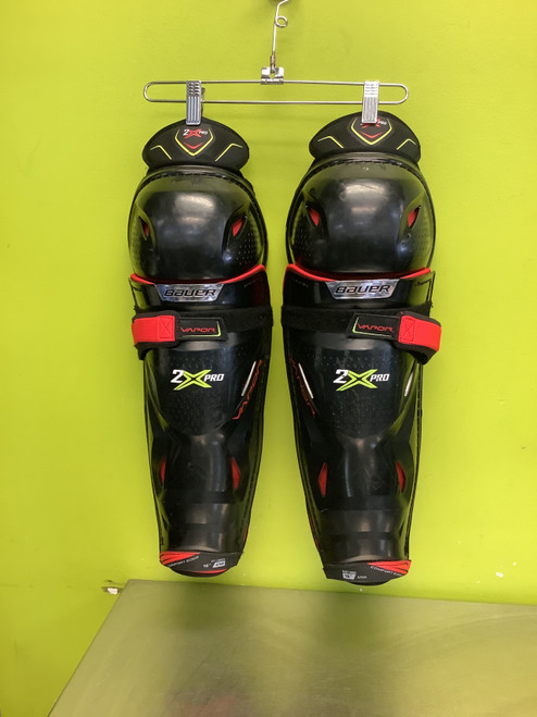 Vist Large View of Product Image Which is Used Bauer VAPOR X2 PRO Senior Shin Guards Black 16"