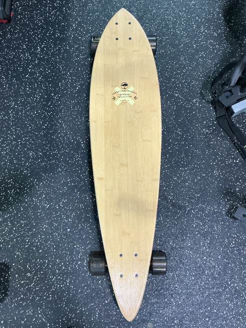 Vist Large View of Product Image Which is Used Arbor BAMBOO FISH Longboard Brown Long