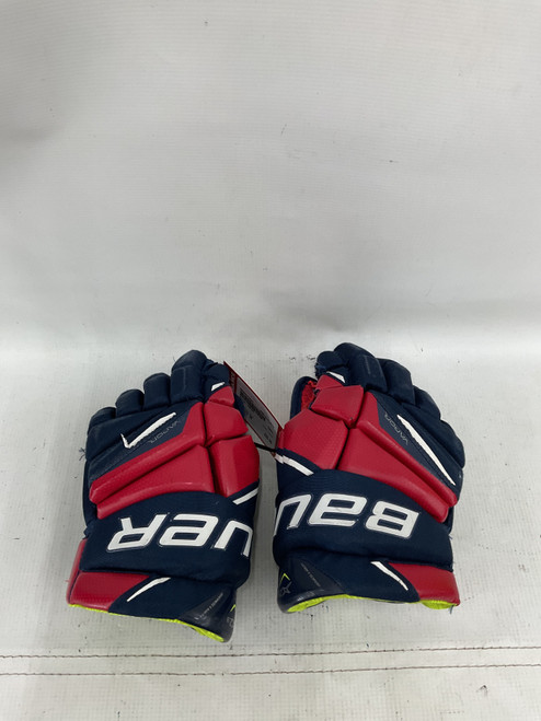 Vist Large View of Product Image Which is Used Bauer VAPOR Junior Gloves Navy Blue 12"