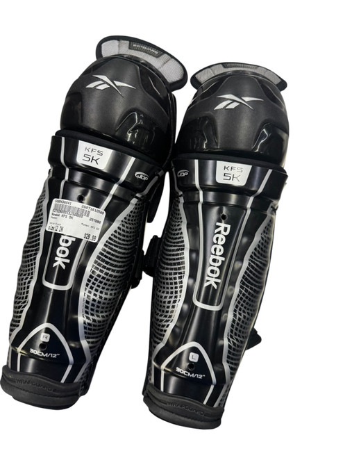 Vist Large View of Product Image Which is Used Reebok KFS 5K Junior Shin Guards Black 12"