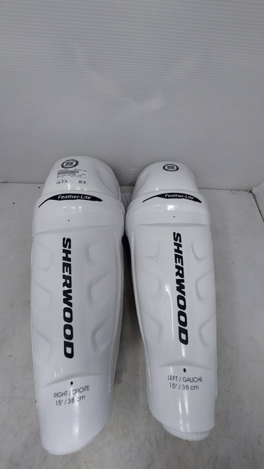Vist Large View of Product Image Which is Used Sher-wood FEATHER LITE Senior Shin Guards White 15"