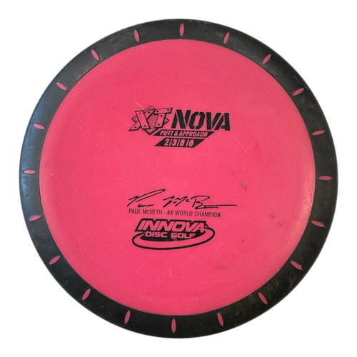 Vist Large View of Product Image Which is Used Innova XT NOVA Disc Golf Putter Pink 172g