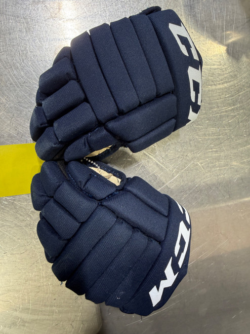 Vist Large View of Product Image Which is Used CCM LTP Youth Gloves Navy Blue 9"