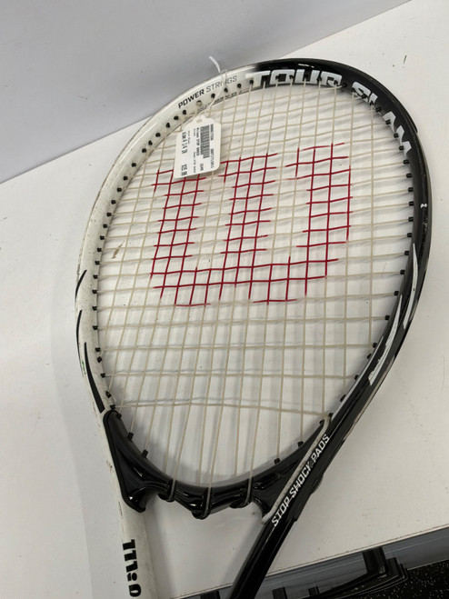 Vist Large View of Product Image Which is Used Wilson STOP SHOCK Adult Tennis Racquet Black 4 1/4"