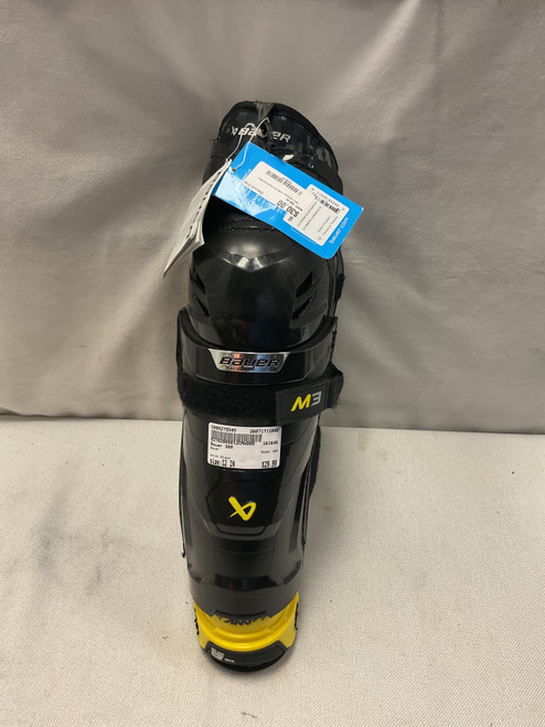 Vist Large View of Product Image Which is Used Bauer 300 Youth Shin Guards Black 12"