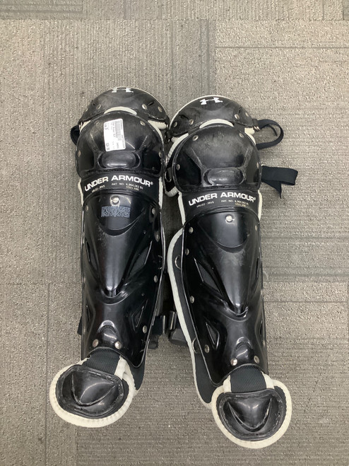 Vist Large View of Product Image Which is Used Under Armour BLK Catchers Leg Guards Black Junior