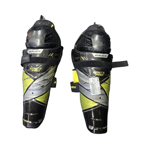 Vist Large View of Product Image Which is Used Bauer SUPREME IGNITE PRO 12 IN SHIN GUARDS Junior Shin Guards Black 12"