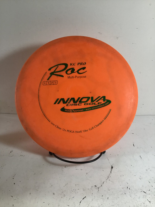 Vist Large View of Product Image Which is Used Innova KC PRO ROC Disc Golf Mid Range Orange 177g