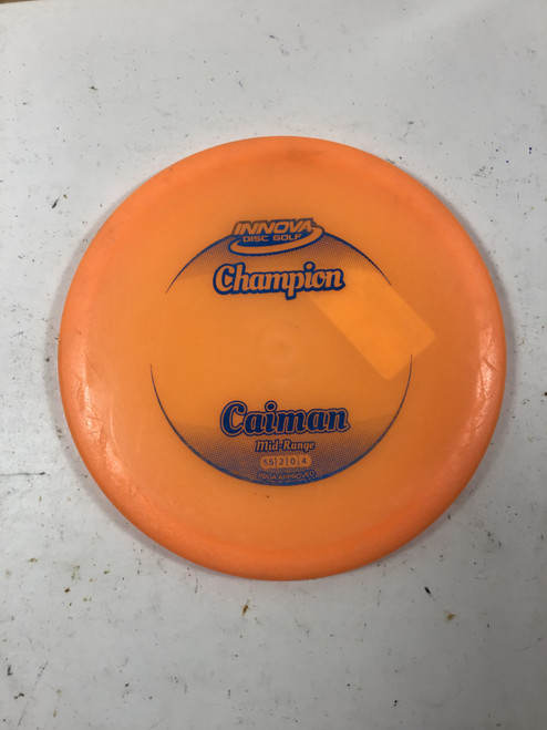 Vist Large View of Product Image Which is Used Innova CHAMPION CAIMAN Disc Golf Mid Range Orange 171g