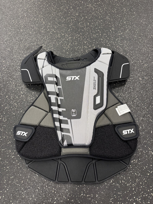 Vist Large View of Product Image Which is Used STX SHIELD 400 NOCSAE CP NWT LAX Goalie Chest M Black MD
