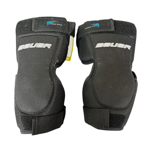 Vist Large View of Product Image Which is Used Bauer REACTOR Goalie Knee Guards Junior Black Medium