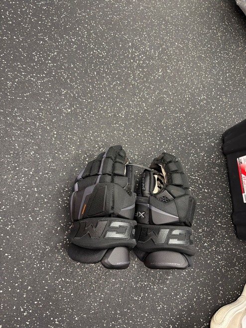 Vist Large View of Product Image Which is Used CCM TACKS XF PRO Senior Gloves Black 14"