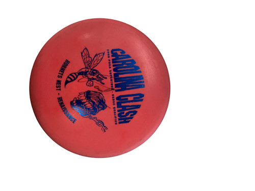 Vist Large View of Product Image Which is Used Innova DX CAROLINA CLASH Disc Golf Mid Range Red