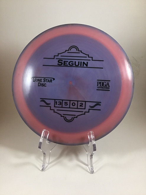 Vist Large View of Product Image Which is Used Lone Star Disc ALPHA SEGUIN Disc Golf Driver Purple 175g