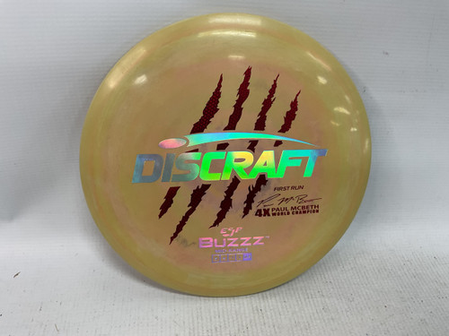 Vist Large View of Product Image Which is Used Discraft FIRST RUN PAUL MCBETH ESP BUZZZ Disc Golf Mid Range Gold