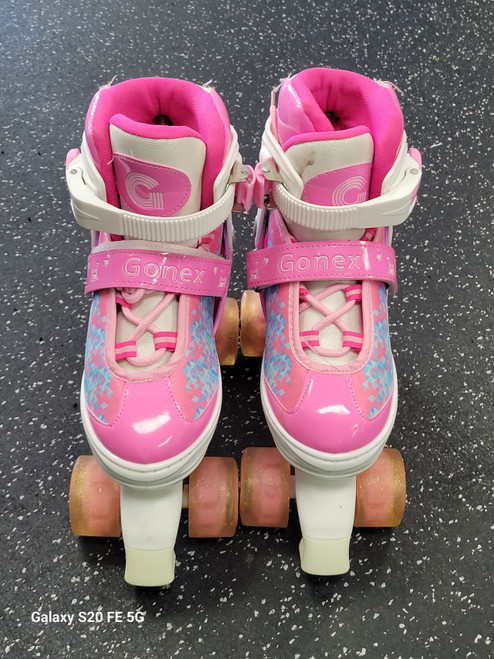 Vist Large View of Product Image Which is Used GONNEX Junior Roller Quad Skates White Adjustable