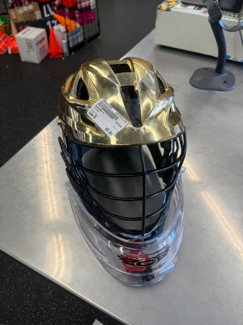 Vist Large View of Product Image Which is Used Cascade S Lacrosse Helmet Gold One Size